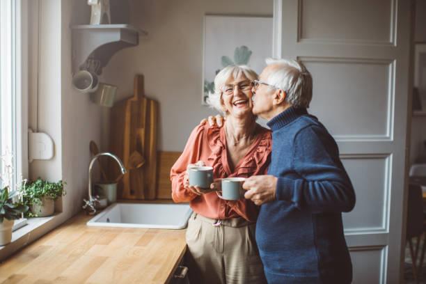 an older couple happy at home